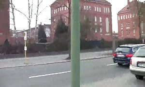 dressed gf with ebony hair is deepthroating my cock in the rest room