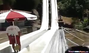 teen Loses Her Top On The Waterslide