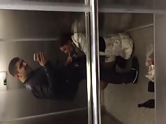 Impressive blowjob in the elevator performed by a young brunette