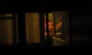 My next-door neighbor
 is having fun by herself!